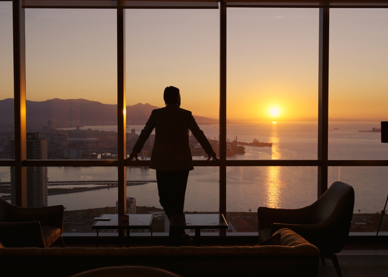Business manager in the office during sunset